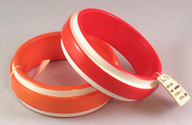 LG65 orange lucite bangles